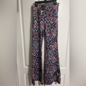 SWEATY BETTY Flare legs High Waist leggings size S / Color- Purple